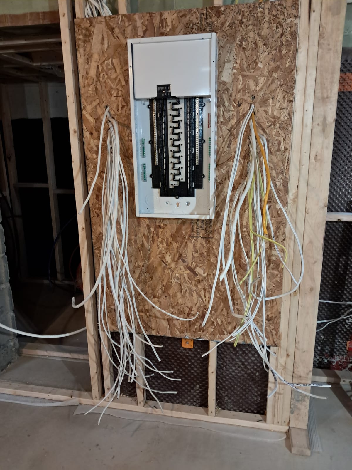 Electrical panel with neatly run wiring after rewire